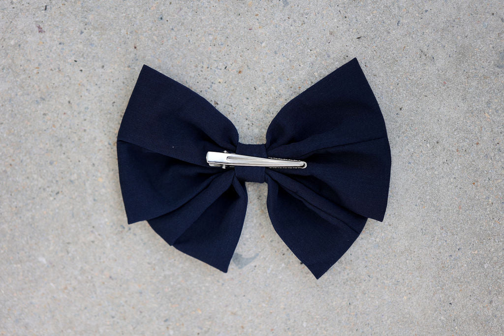 Alessia Bow Bianco by Lessi The Label | Luxurious Kids’ Hair Accessory. Elevate your child’s style with the Alessia Bow Bianco by Lessi The Label—an oversized, high-quality bow available in four timeless colors. Perfect for adding a touch of luxury to any outfit. Enjoy 10% off your first order, free shipping on orders over $100, and worldwide delivery!