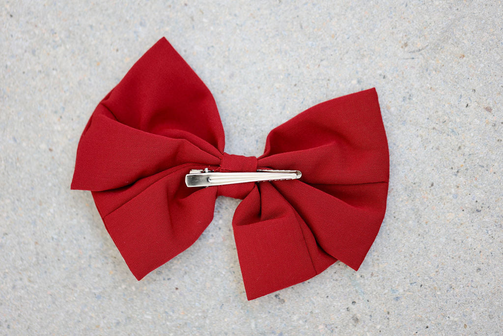 Discover the Alessia Bow in Rosso, a signature piece by Lessi the Label. Crafted for elegance, this extra-large bow makes your little one feel like royalty. Available in multiple colors to complement any style. Enjoy worldwide shipping and 10% off your first order!